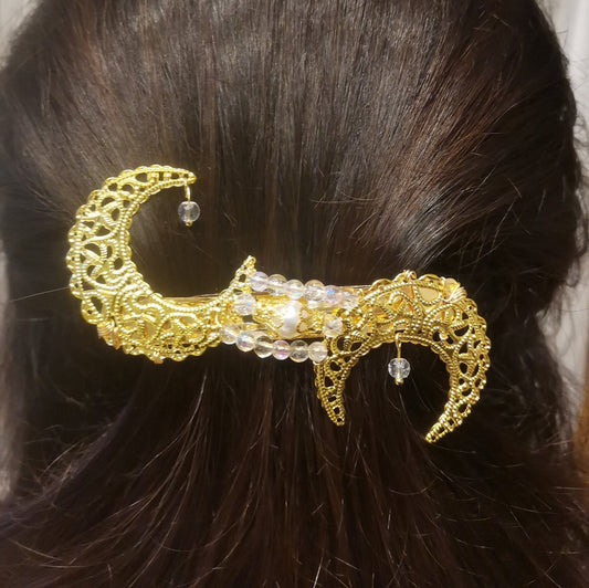 Pasador muy original con dos medias lunas metálicas